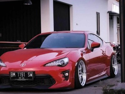 Hot and flamboyant, Toyota 86 red body modified Stance Nation style